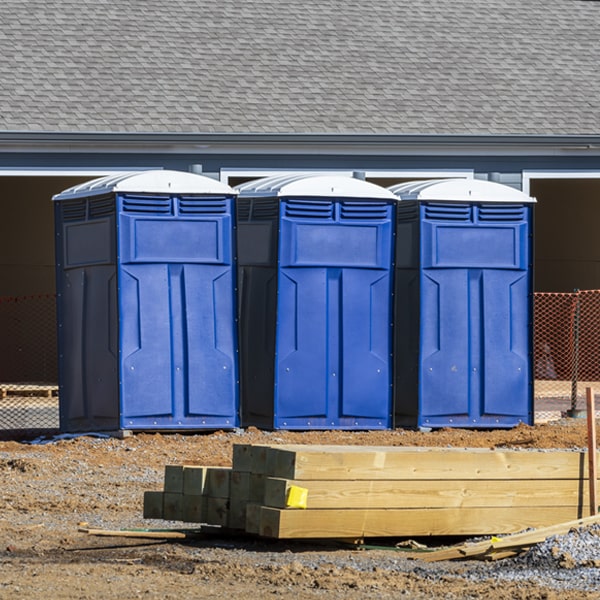 what is the cost difference between standard and deluxe porta potty rentals in Ackerly